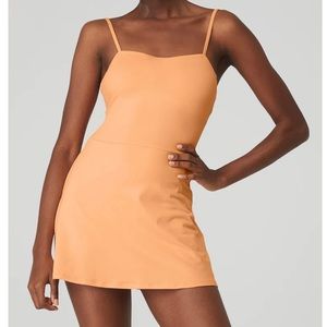ALO YOGA Alosoft Courtside dress in color cantaloupe!